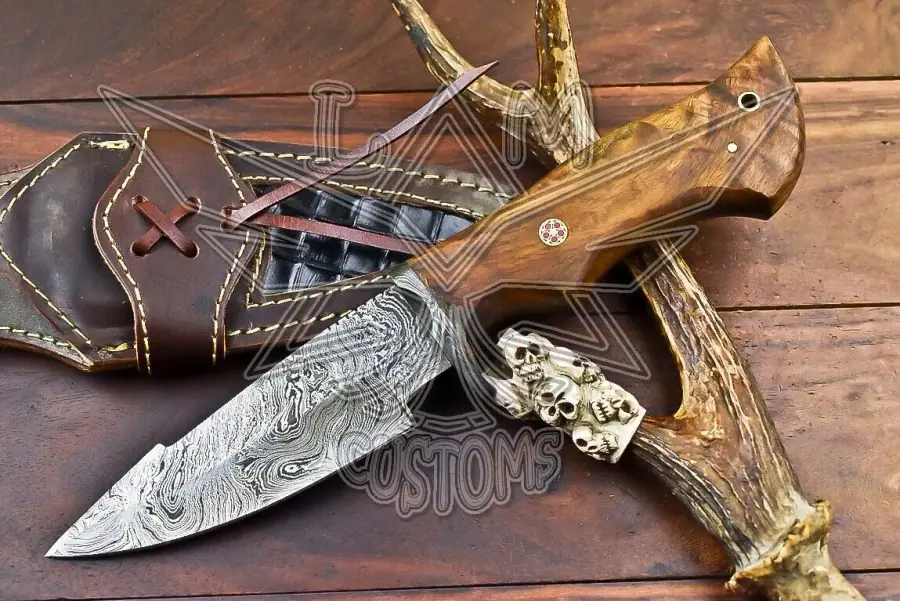 Handmade Damascus skinner knife with walnut wood handle and leather sheath